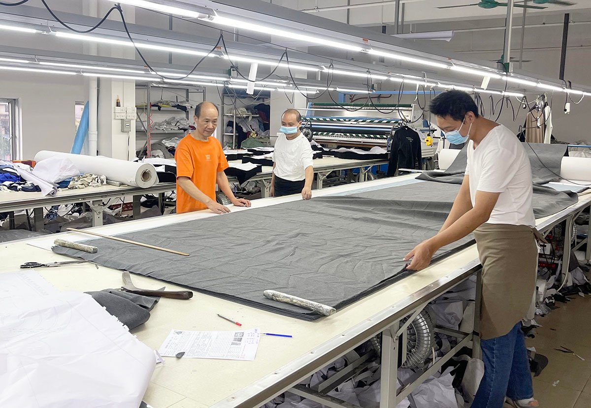 Fabric cutting area with automatic cutting machine